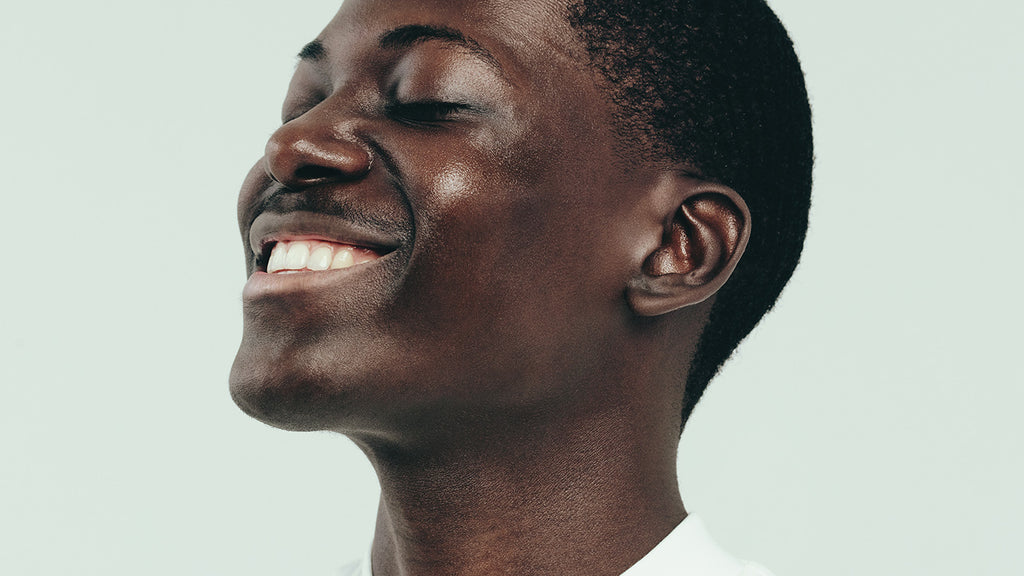 Why men’s skin gets so oily in the summer and how to stop it